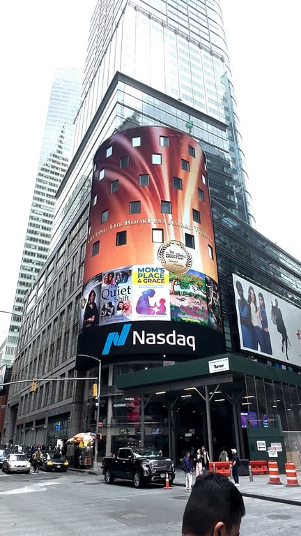 The NASDQ billboard on the side of a building in new york city